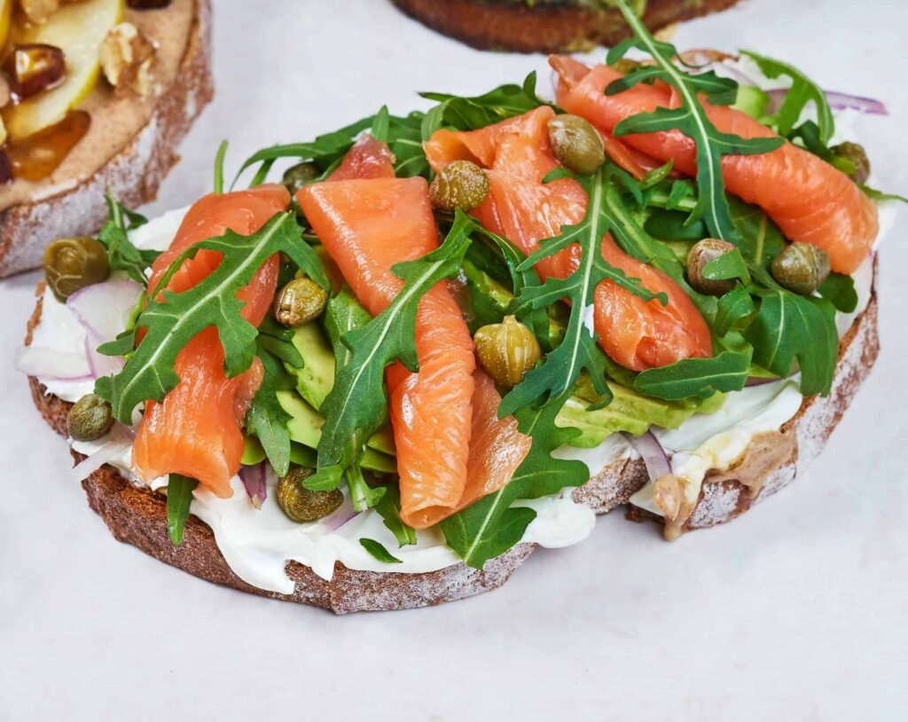 Avocado Toast with Smoked Salmon with a sprinkle of seeds, a high protein breakfast for weight loss