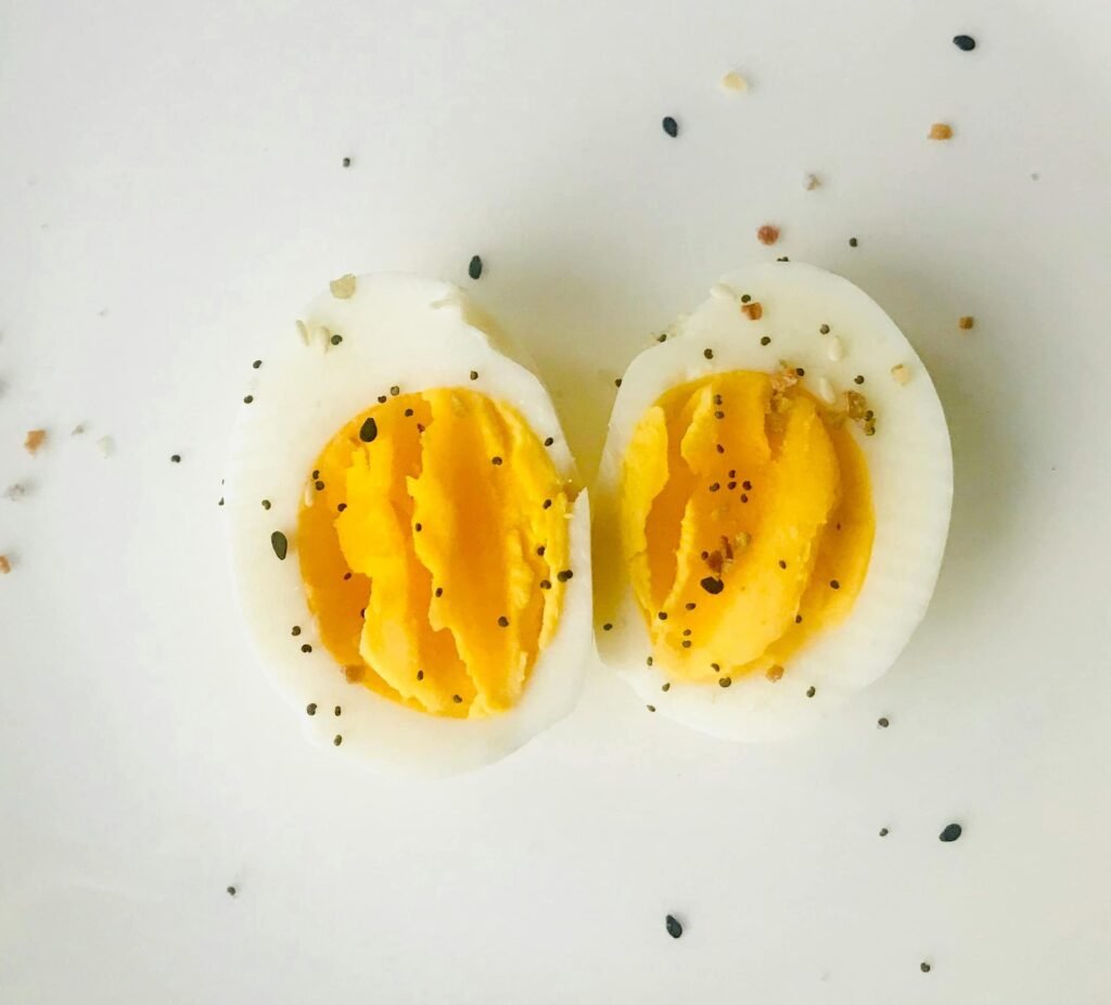 sliced boiled egg on a white plate