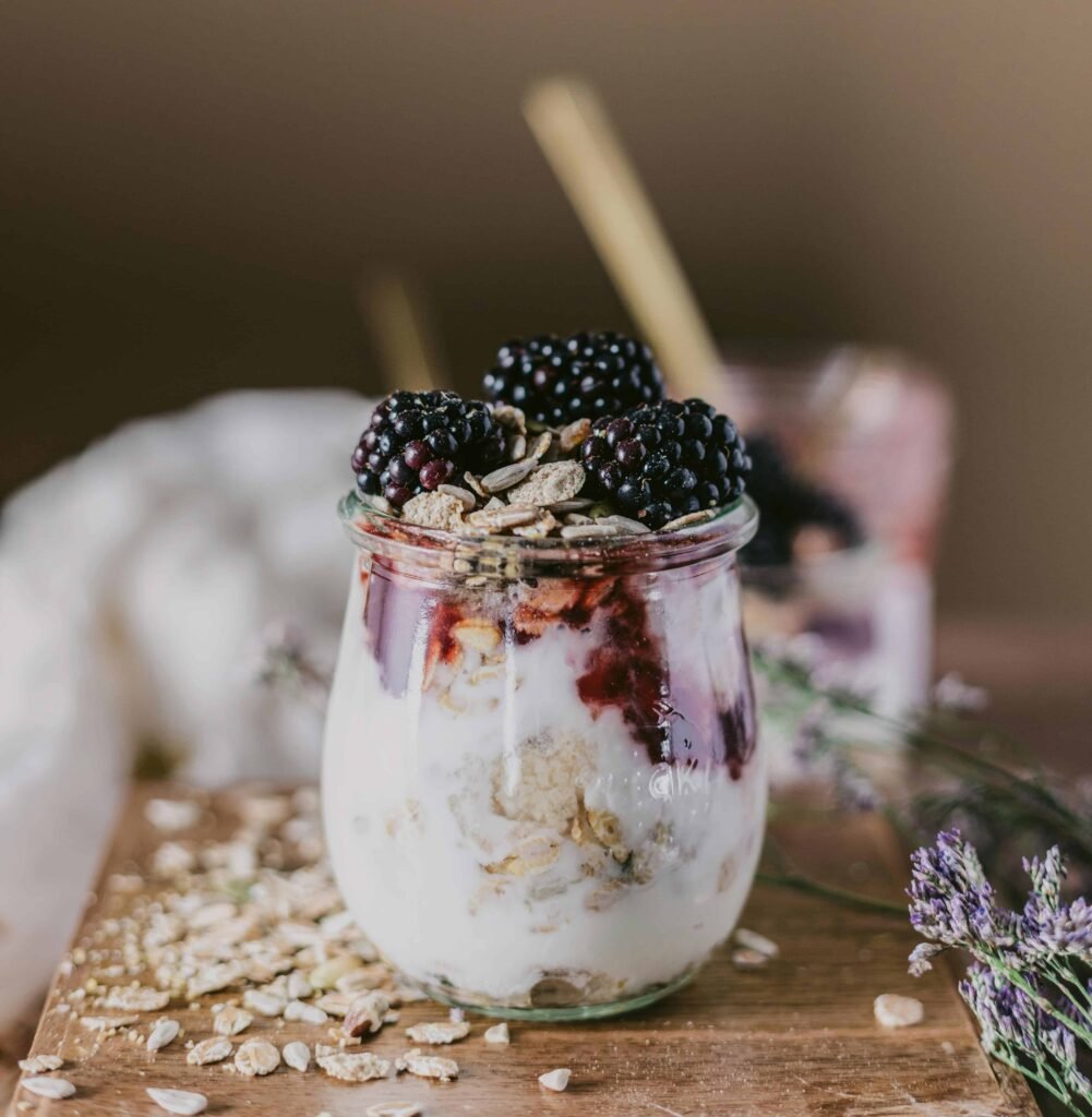 Greek yogurt parfait with berries , a high-protein breakfast for weight loss