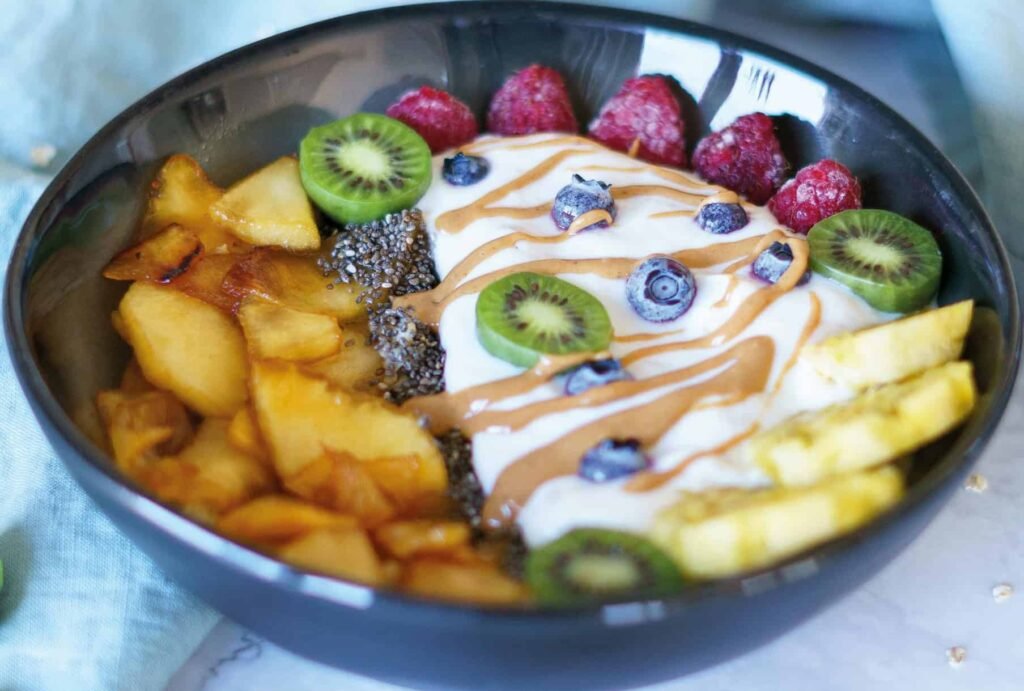 Greek Yogurt with Berries and Almond Butter Greek yogurt with berries, almond butter, kiwi and banana