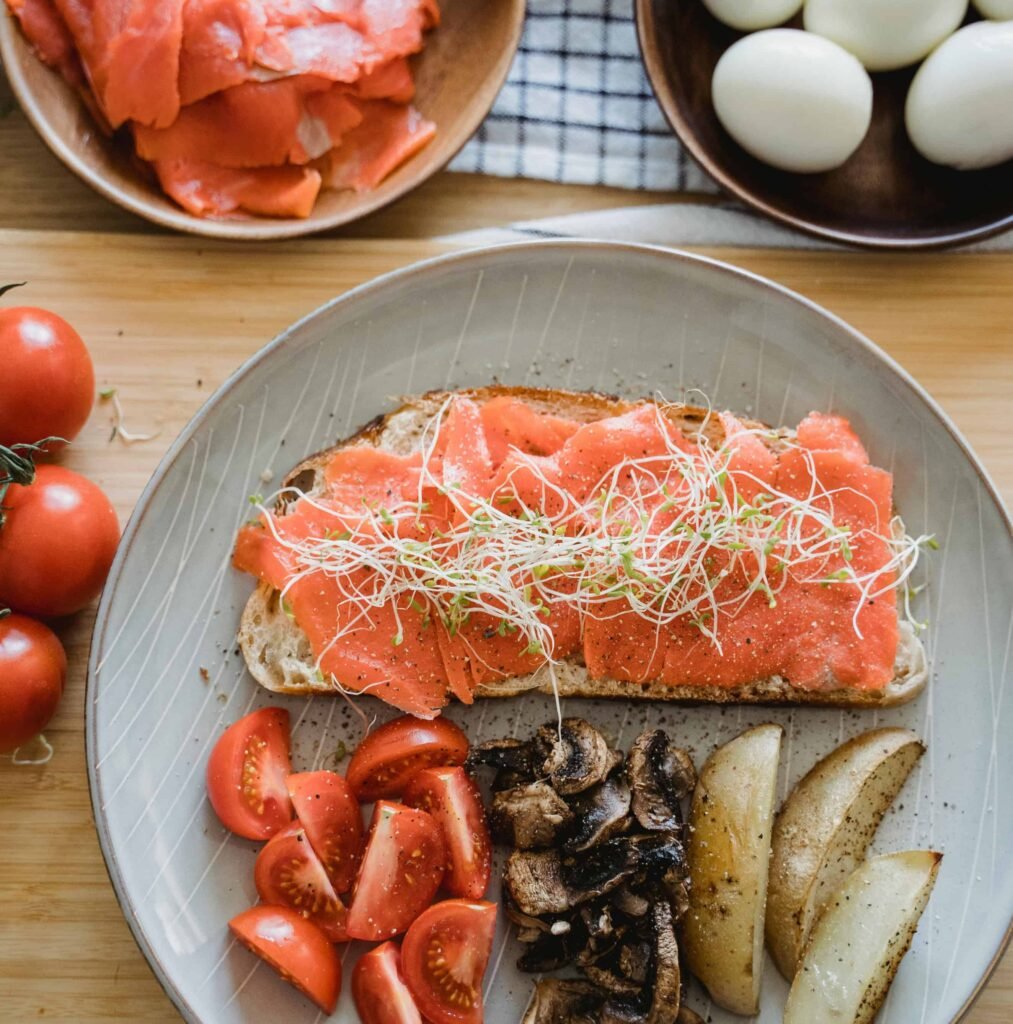 Variety of protein-rich foods including tuna, potato, eggs, and tomato